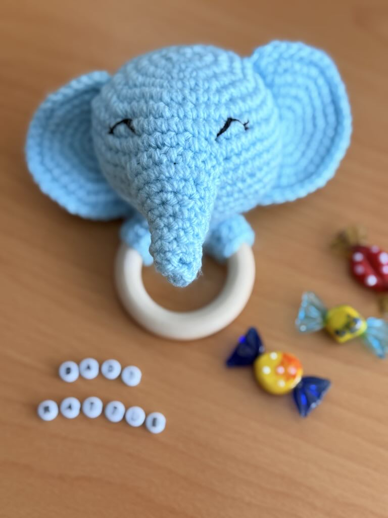 handmade crochet blue elephant baby rattle with soft ears and gentle sound
