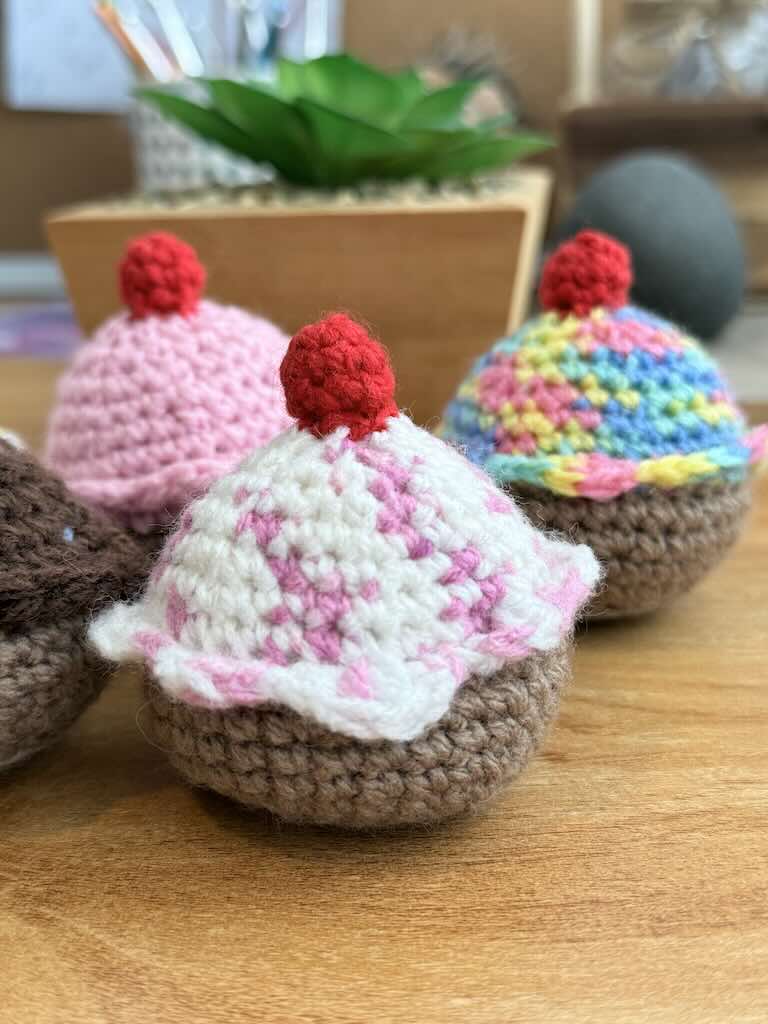 handmade crochet chocolate and cream cupcakes with cherries