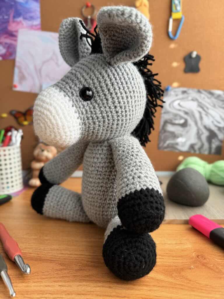 handmade crochet donkey with big ears and sweet expression