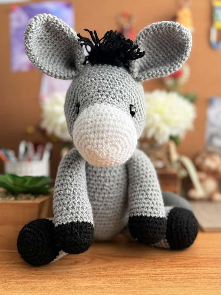 handmade crochet donkey with big ears and sweet expression