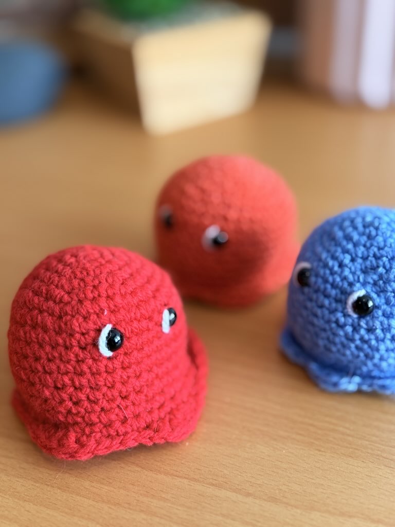 handmade crochet Pac-Man character toy with classic yellow design and Ghosties