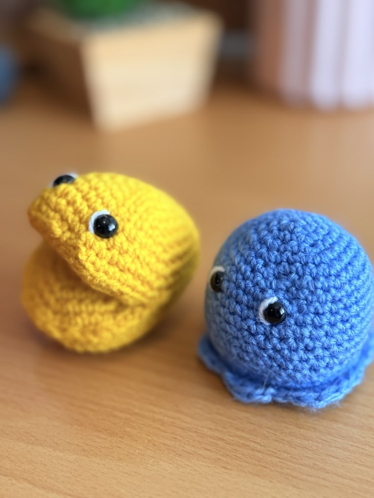 handmade crochet Pac-Man character toy with classic yellow design and Ghosties