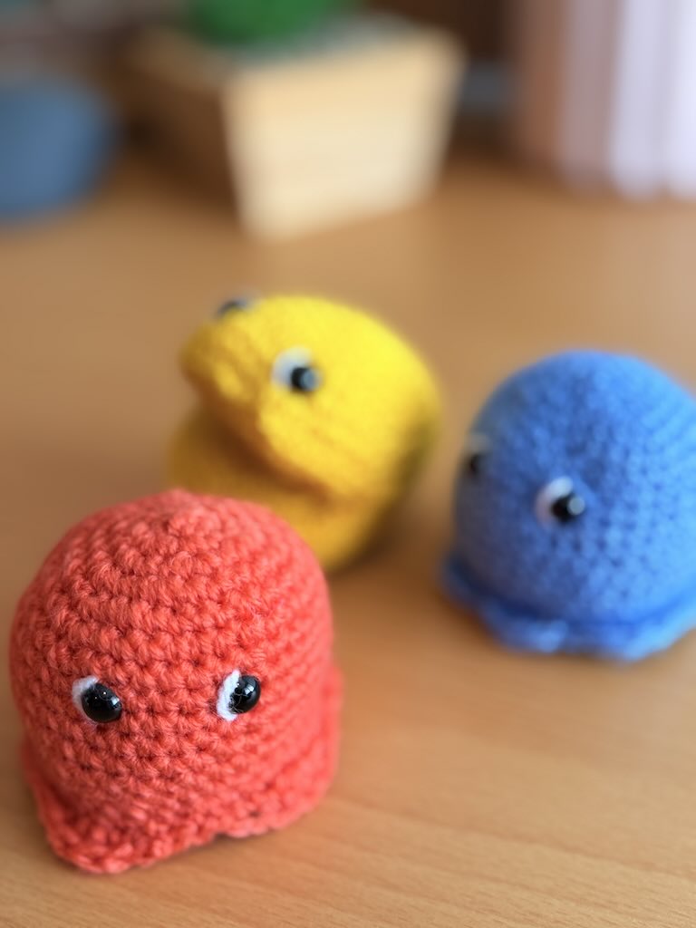 handmade crochet Pac-Man character toy with classic yellow design and Ghosties