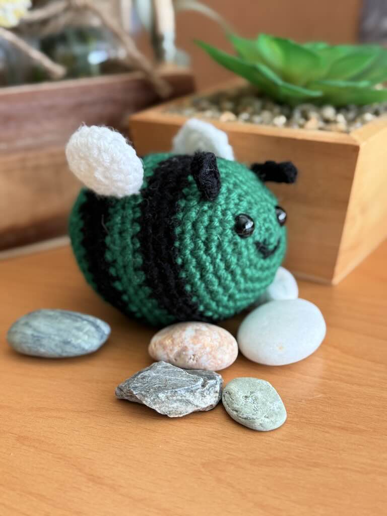 handmade crochet little bee with green and black stripes