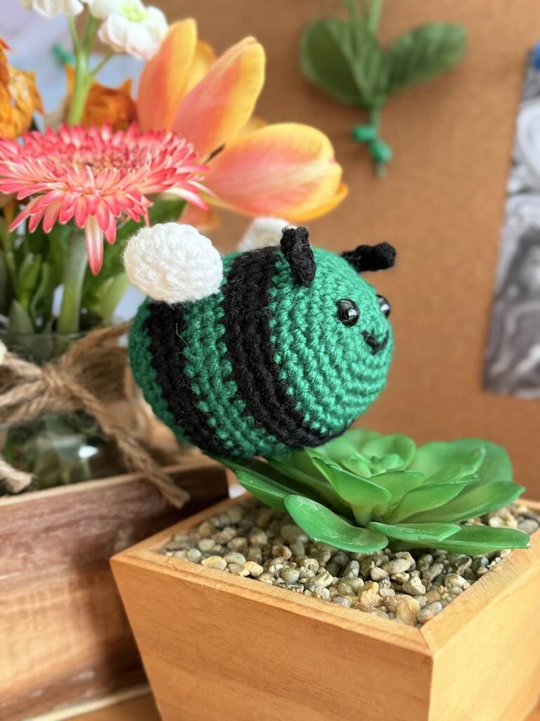 handmade crochet little bee with green and black stripes