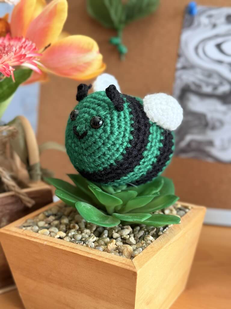 handmade crochet little bee with green and black stripes