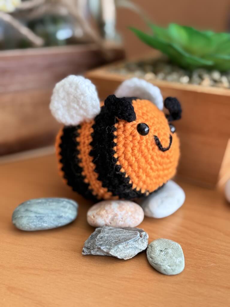 crochet little bee with orange and black stripes