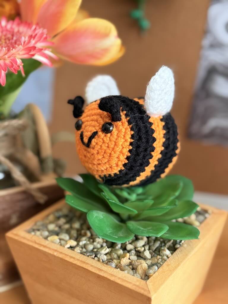 crochet little bee with orange and black stripes