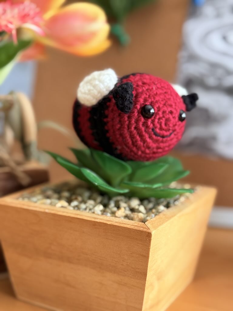 crochet little bee with red and black stripes