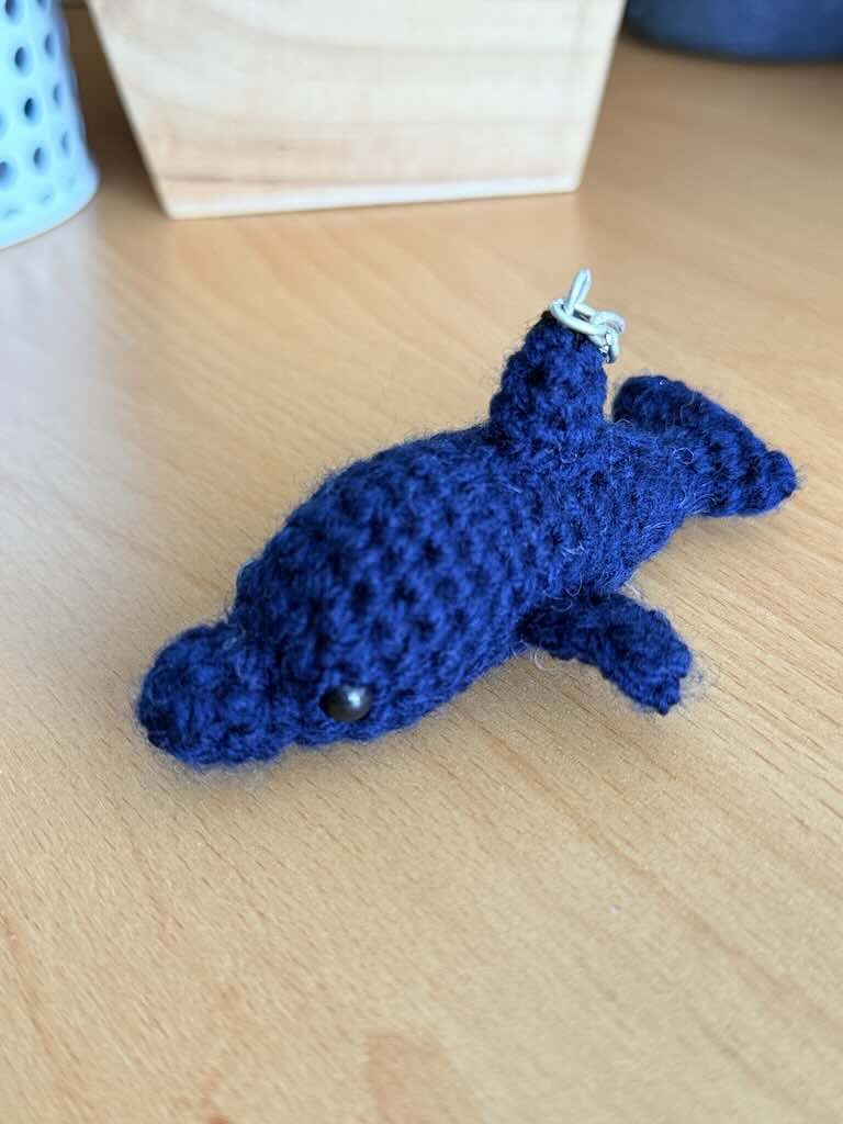 keychain handmade crochet dolphin toy with curved body and soft fins