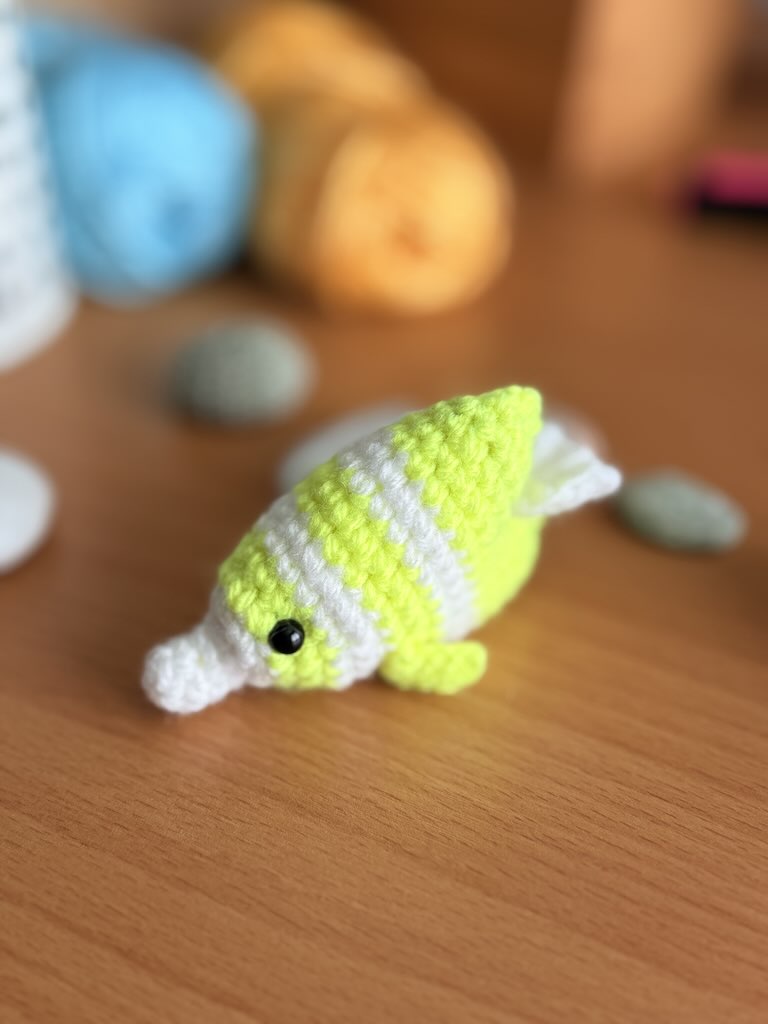 handmade crochet fish keychain toy with white and yellow colors