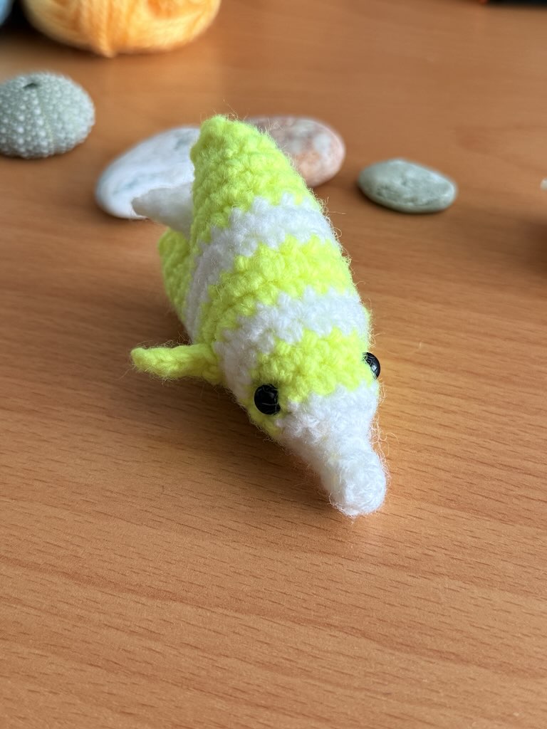 handmade crochet fish keychain toy with white and yellow colors