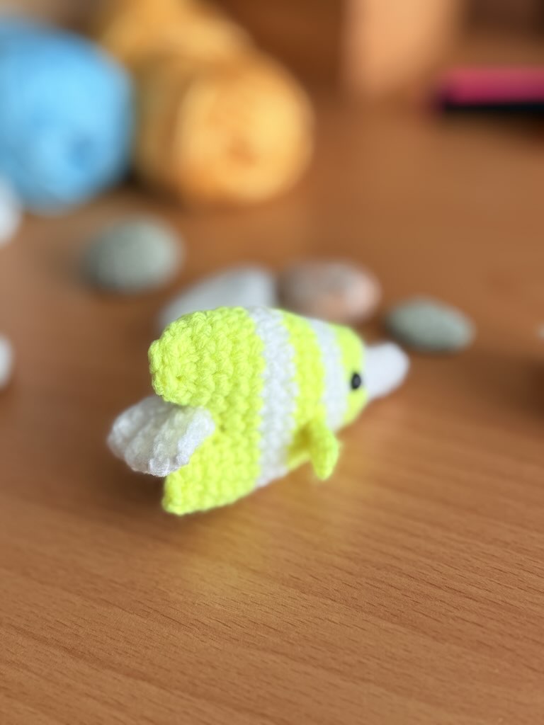 handmade crochet fish keychain toy with white and yellow colors