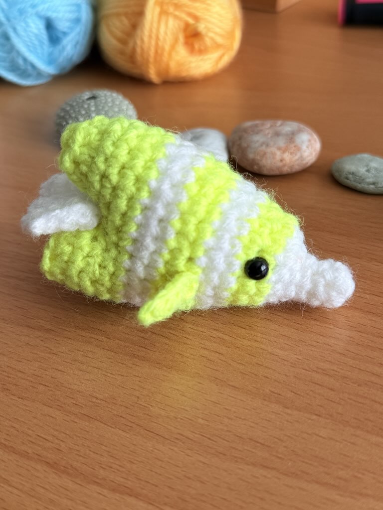 handmade crochet fish keychain toy with white and yellow colors