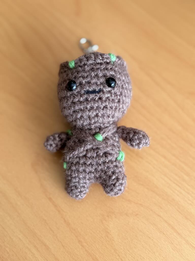 keychain crochet Groot toy with brown body and cute face
