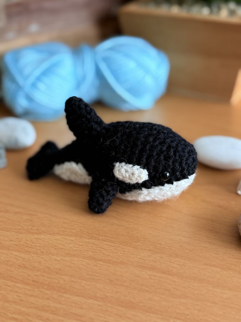 handmade crochet mini orca whale with black and white pattern