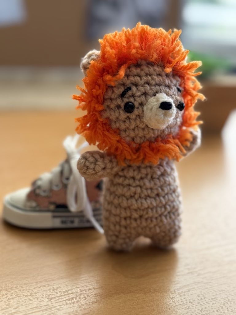 handmade crochet lion toy named Lenny with soft mane and friendly face