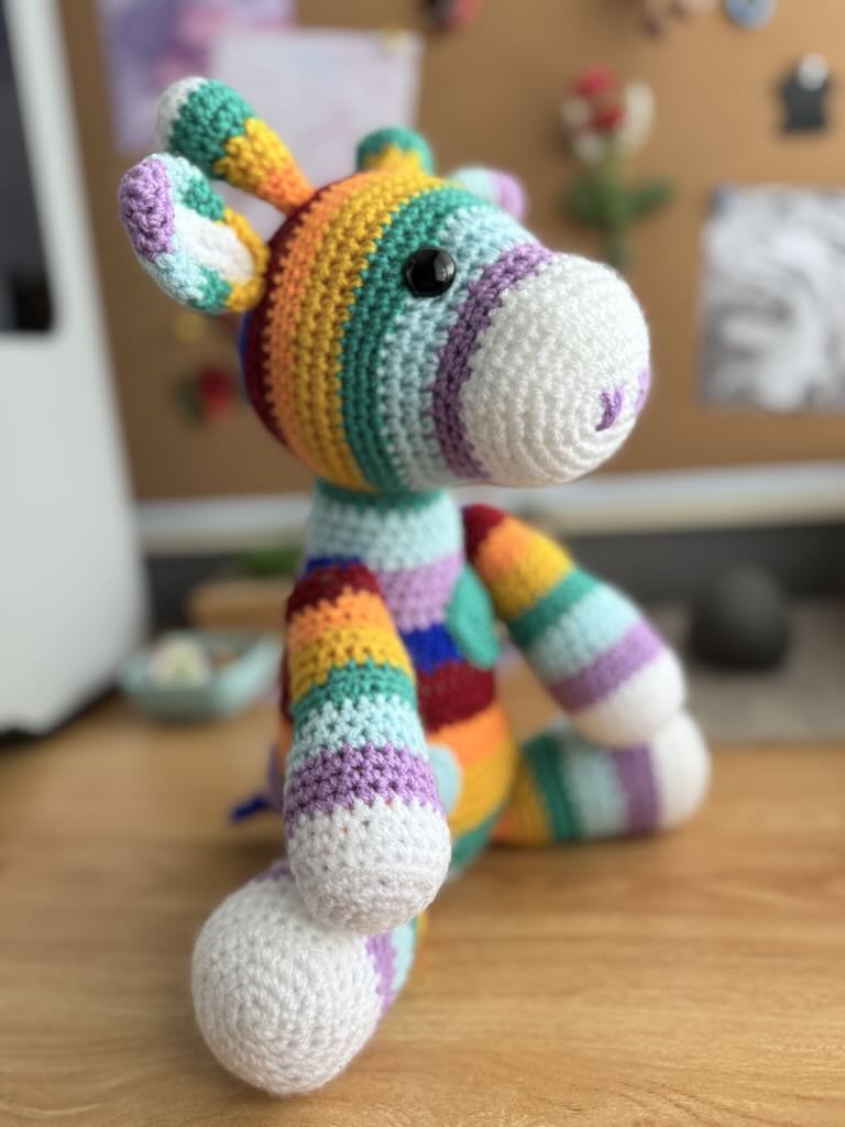 handmade crochet rainbow-coloured zebra