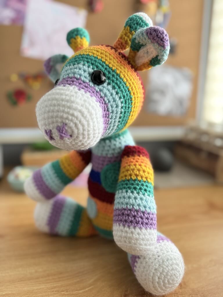 handmade crochet rainbow-coloured zebra