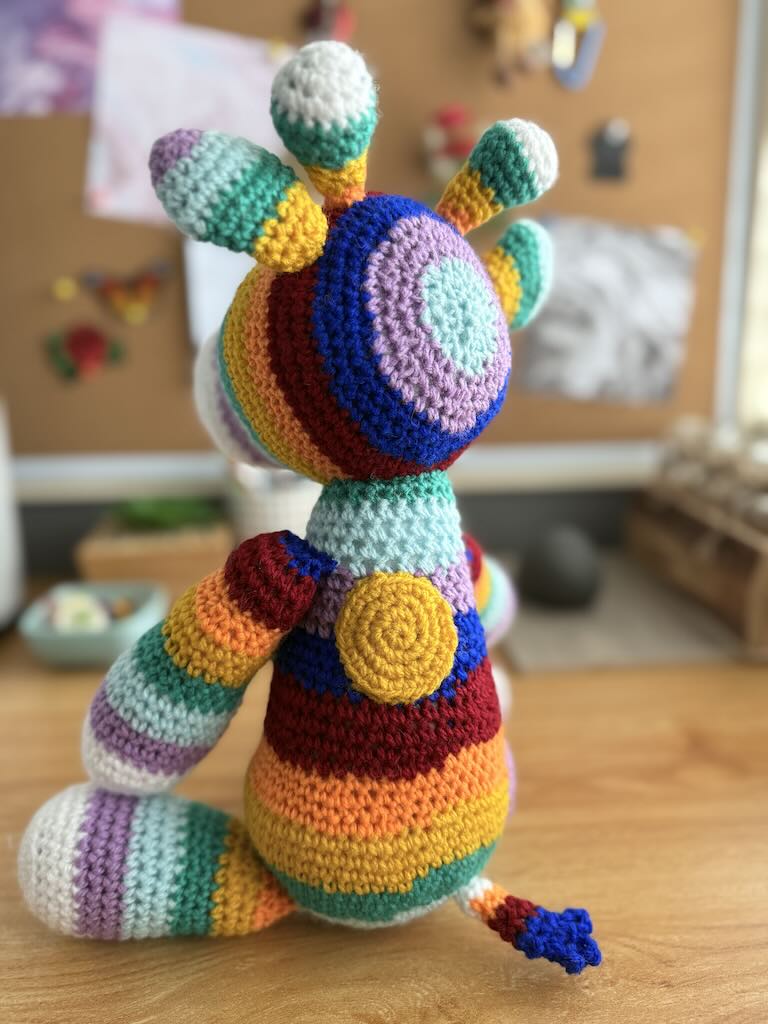 handmade crochet rainbow-coloured zebra