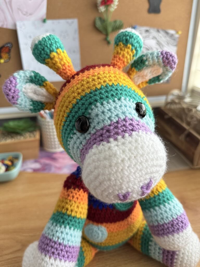 handmade crochet rainbow-coloured zebra