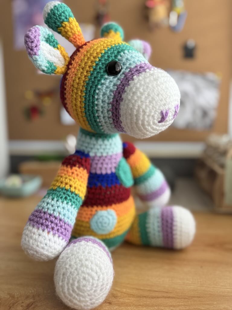handmade crochet rainbow-coloured zebra