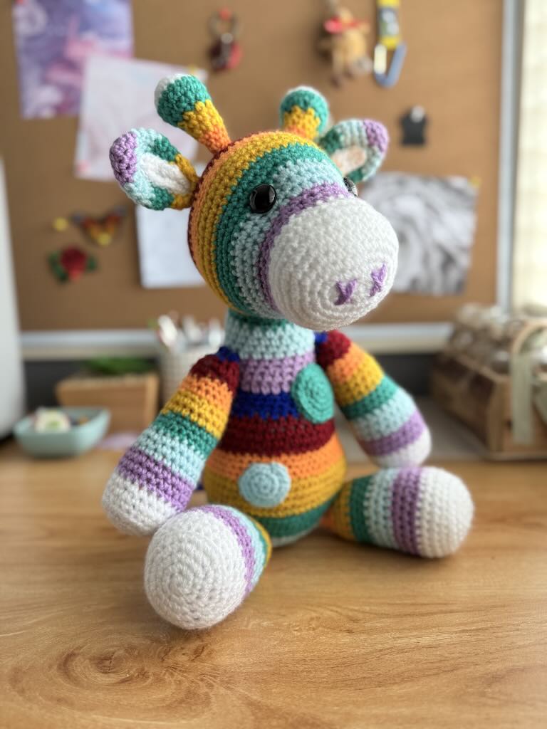 handmade crochet rainbow-coloured zebra