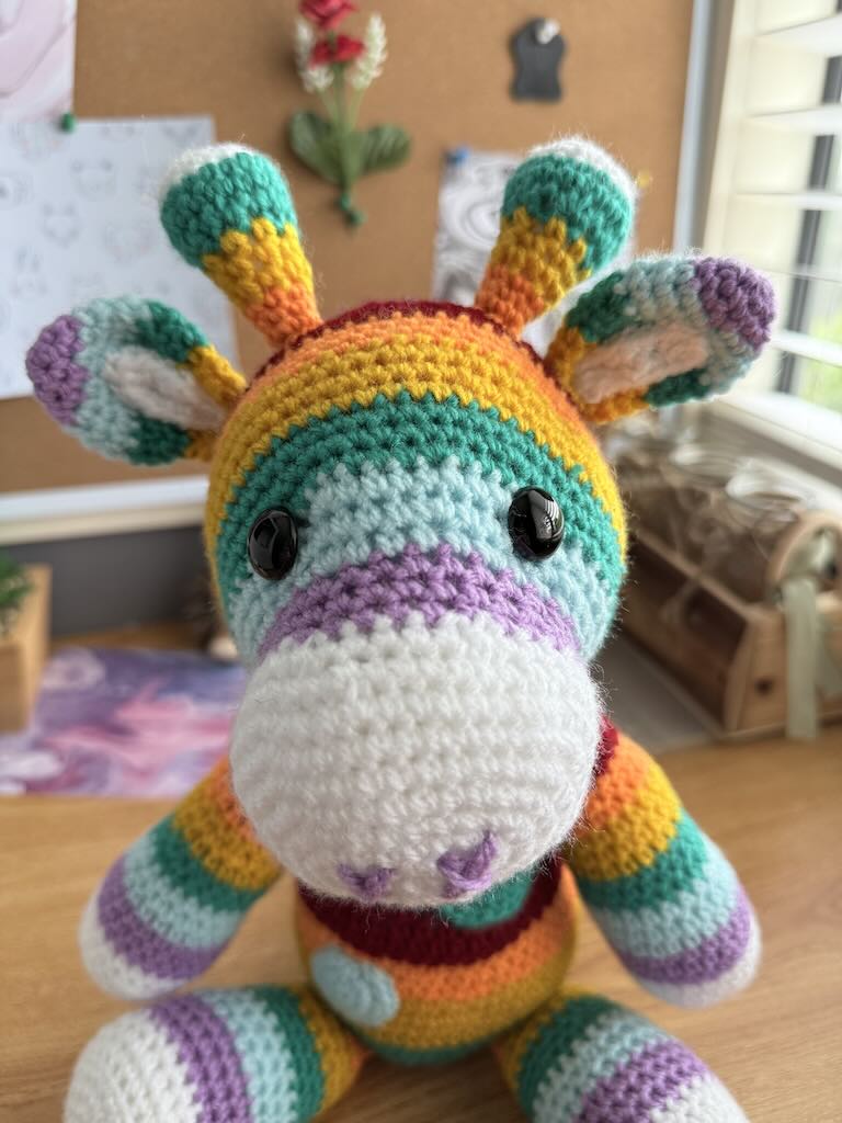 handmade crochet rainbow-coloured zebra