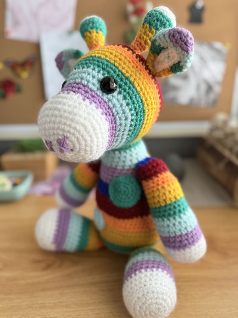 handmade crochet rainbow-coloured zebra