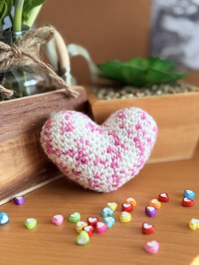 handmade crochet heart in pink and white dots, soft and charming