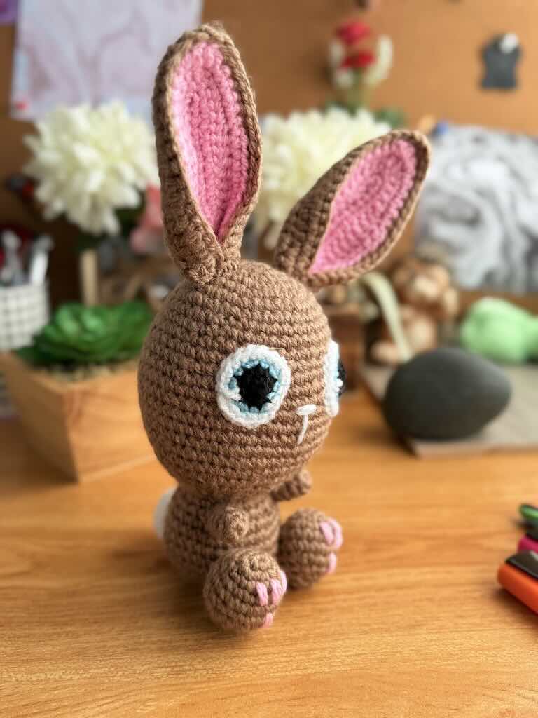 handmade crochet bunny toy named Flopsy with floppy ears and big eyes