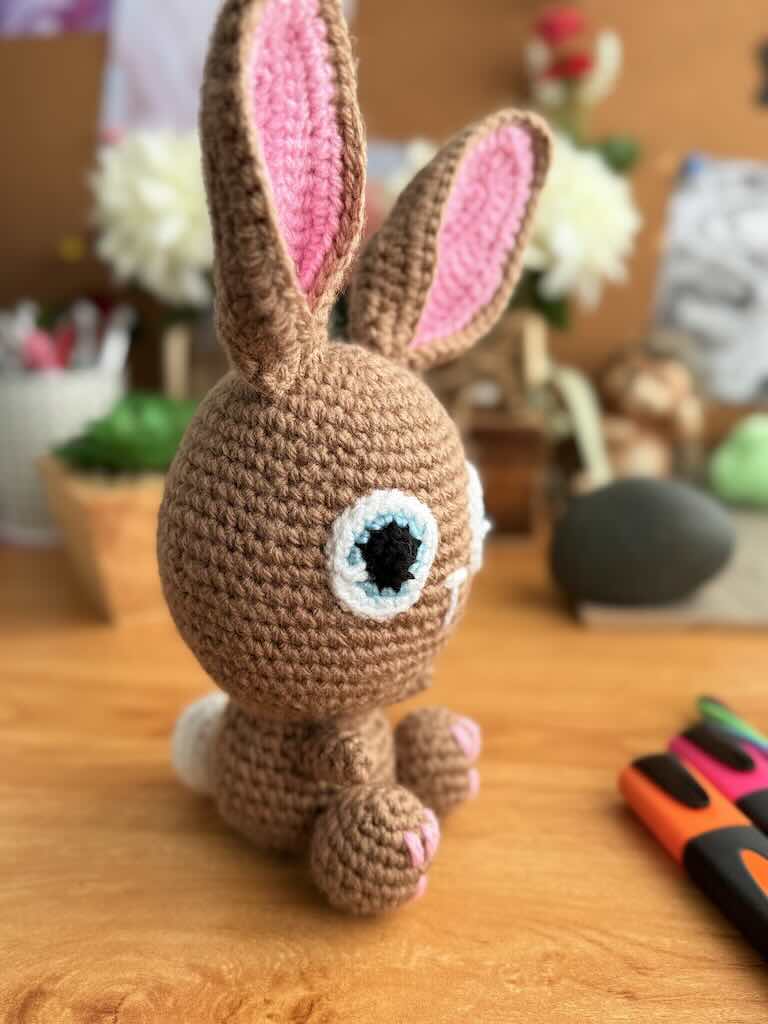 handmade crochet bunny toy named Flopsy with floppy ears and big eyes