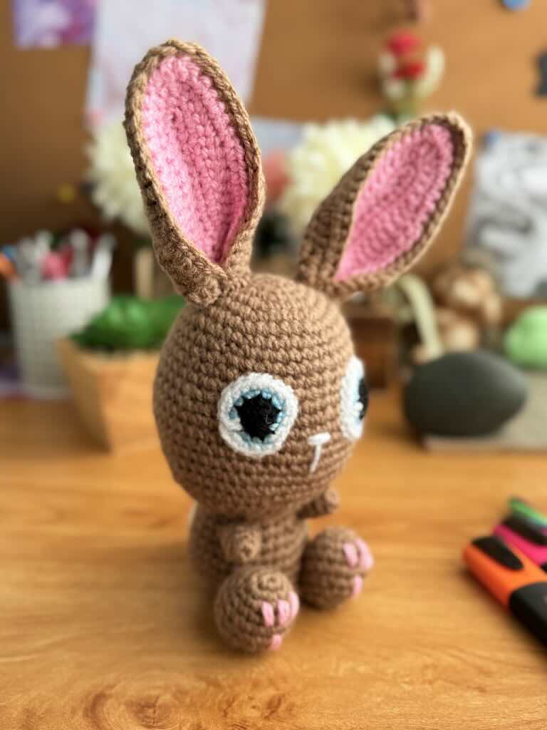 handmade crochet bunny toy named Flopsy with floppy ears and big eyes