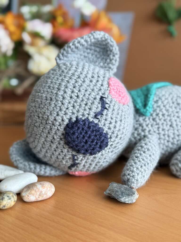 handmade crochet koala toy named Kevin with fluffy ears and sleepy face
